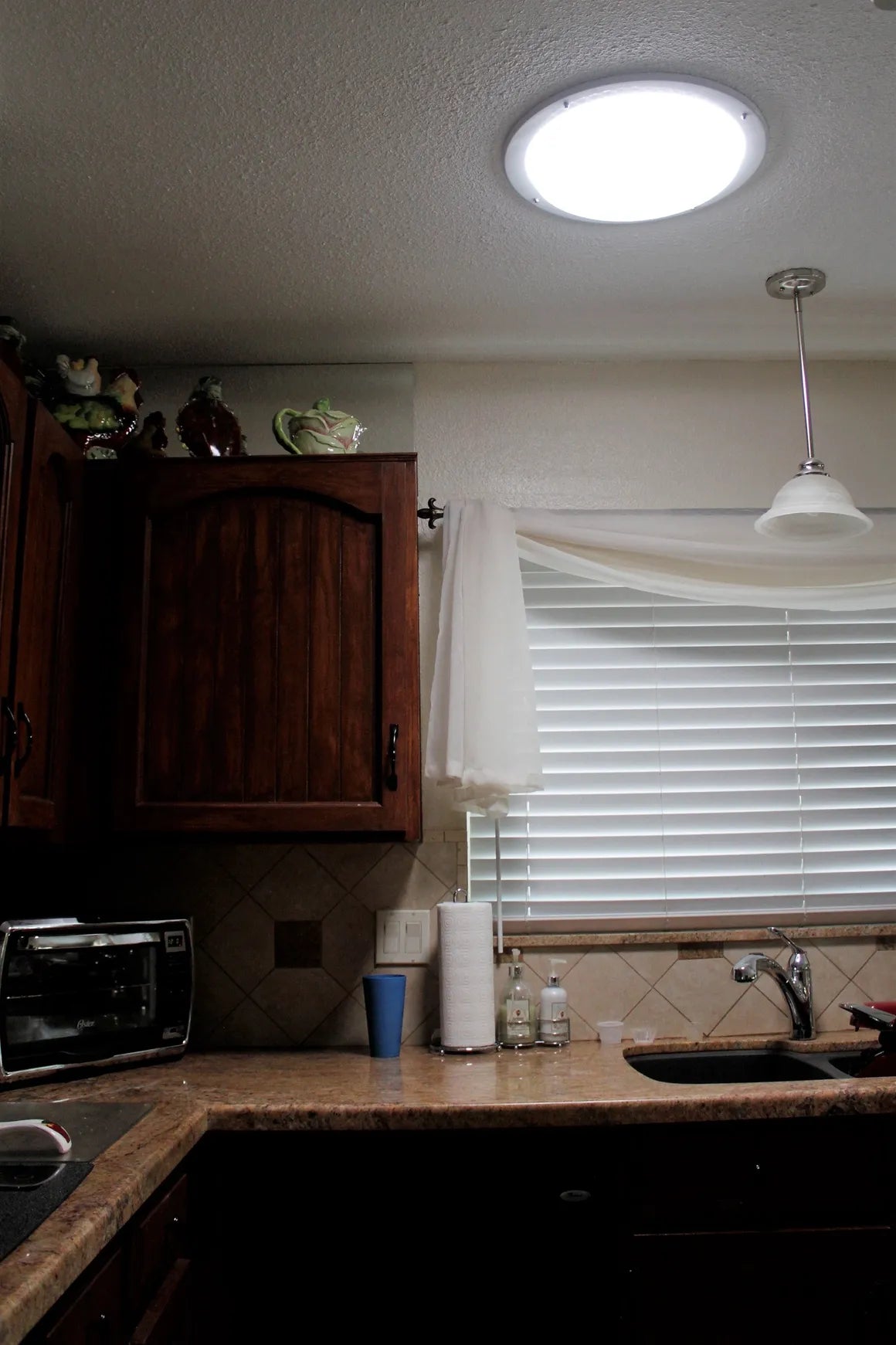 A 14-inch Solar LightBlaster Tubular Skylight for Homes installed in a kitchen.