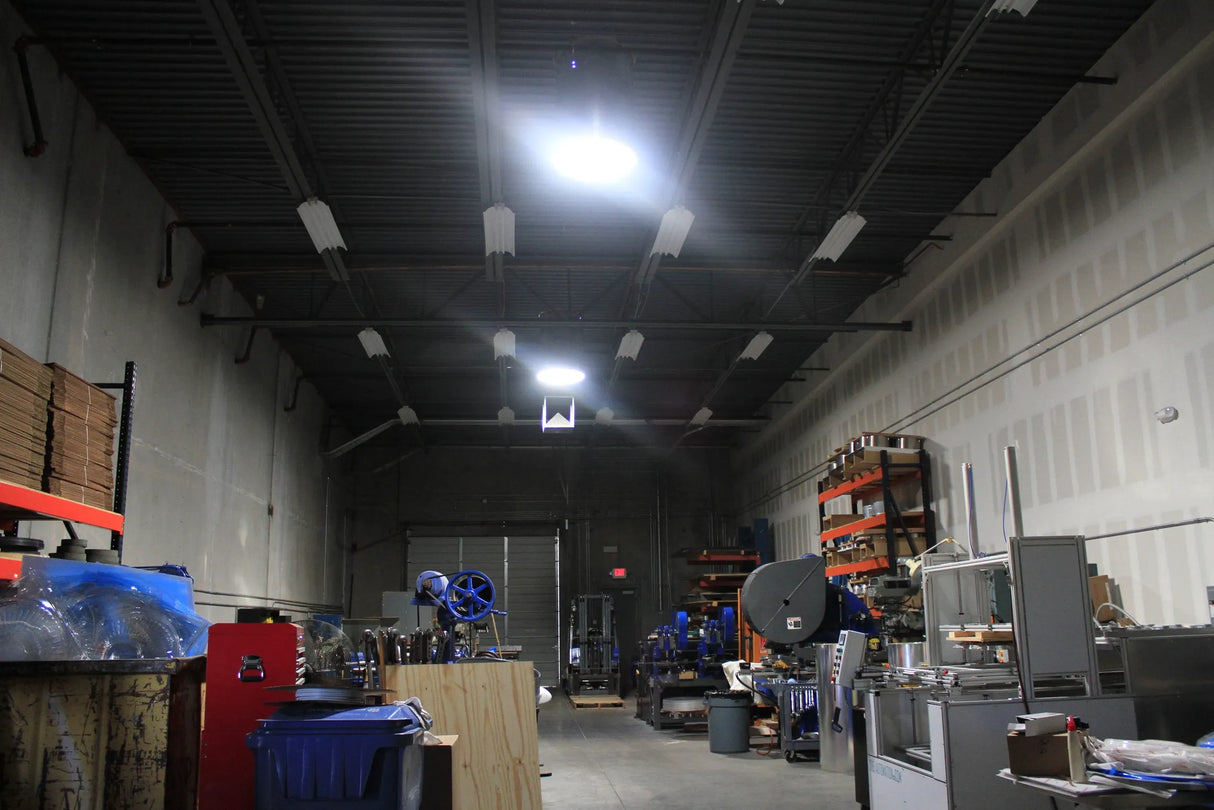 Two 28 inch Solar LightBlaster Tubular Skylight for Warehouses installed in a warehouse.