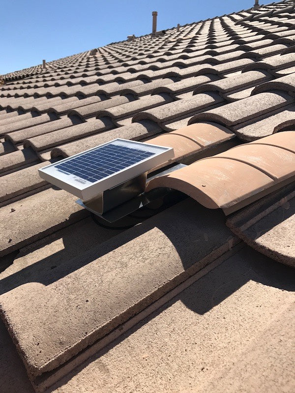 Solar S-TileBlaster installed on a roof that uses "S" style O'Hagin vent. The vent has been painted to match the rest of the tiles.