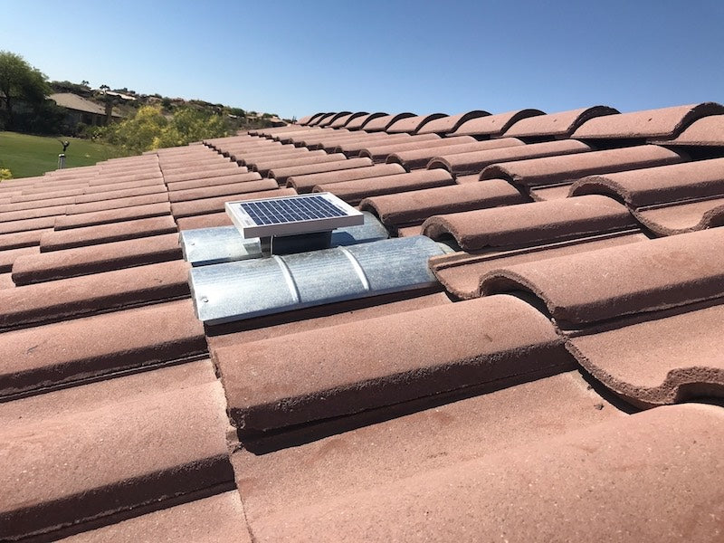 Solar S-TileBlaster installed on a roof that uses "S" style O'Hagin vent. The vent has not been painted yet to match the rest of the tiles.