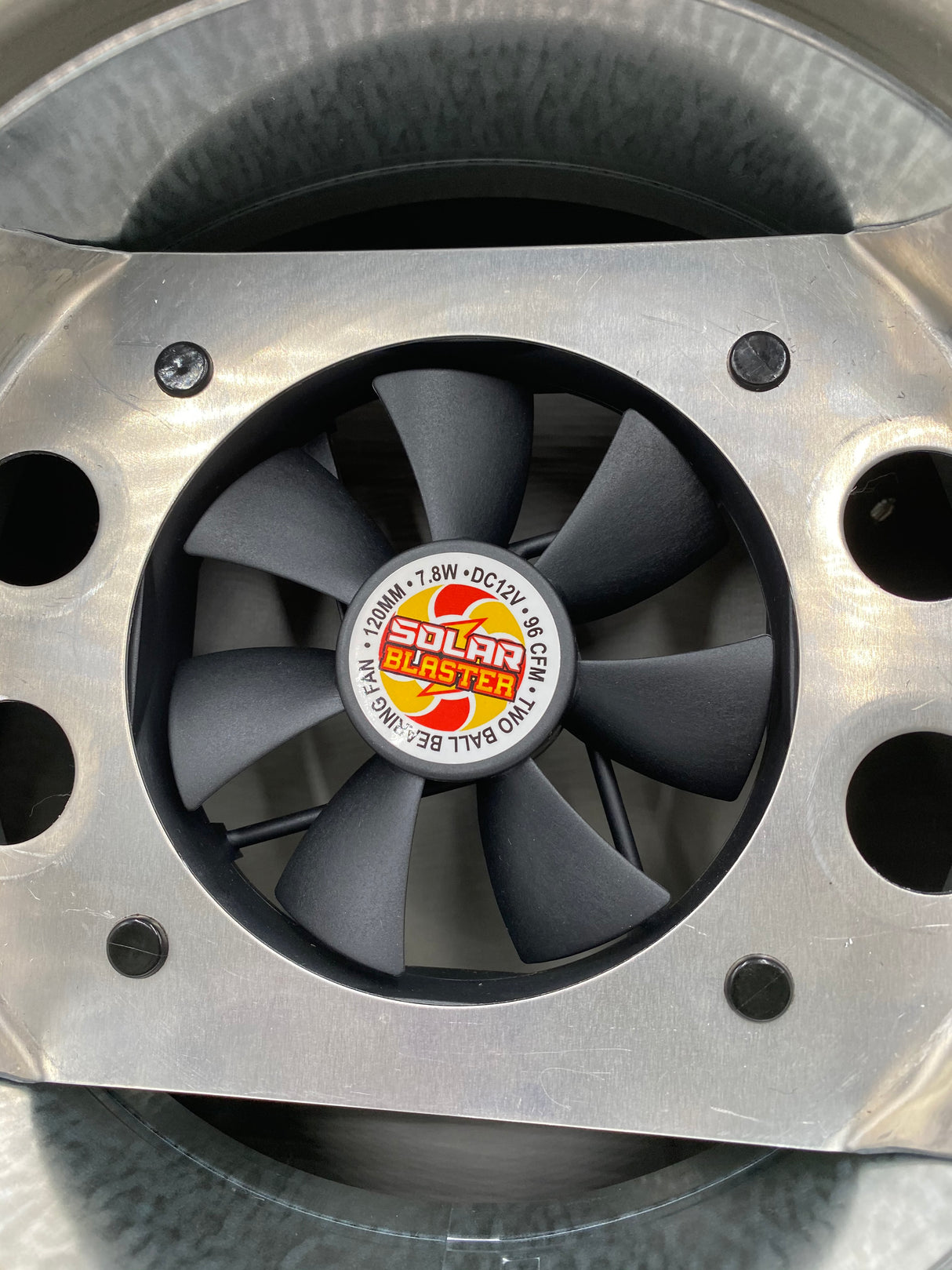 A Solar Mega SlantBlaster vent's underside showing the 120mm fan unit.