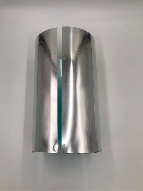 12 inch extension tube laying on its side. This tube is 8 inches in diameter and can be used in the case of false ceilings.