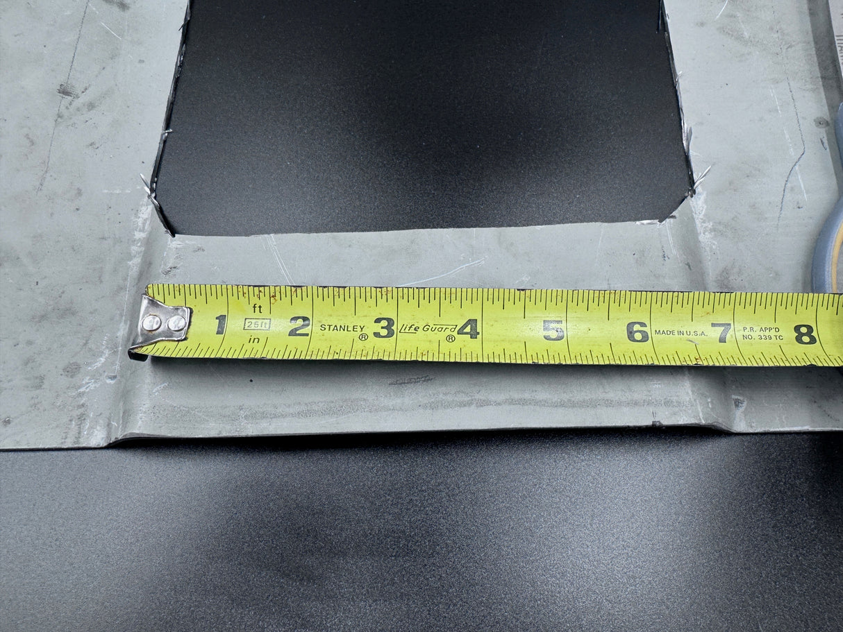 Measurement of a container's roof ribs with a Stanley tape measure, text 'Container Rib Measurement' displayed. This is showing what a 6.5" roof rib looks like and the part of the raised rib you should measure before buying.