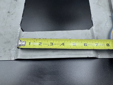 Measurement of a container's roof ribs with a Stanley tape measure, text 'Container Rib Measurement' displayed. This is showing what a 6.5" roof rib looks like and the part of the raised rib you should measure before buying.