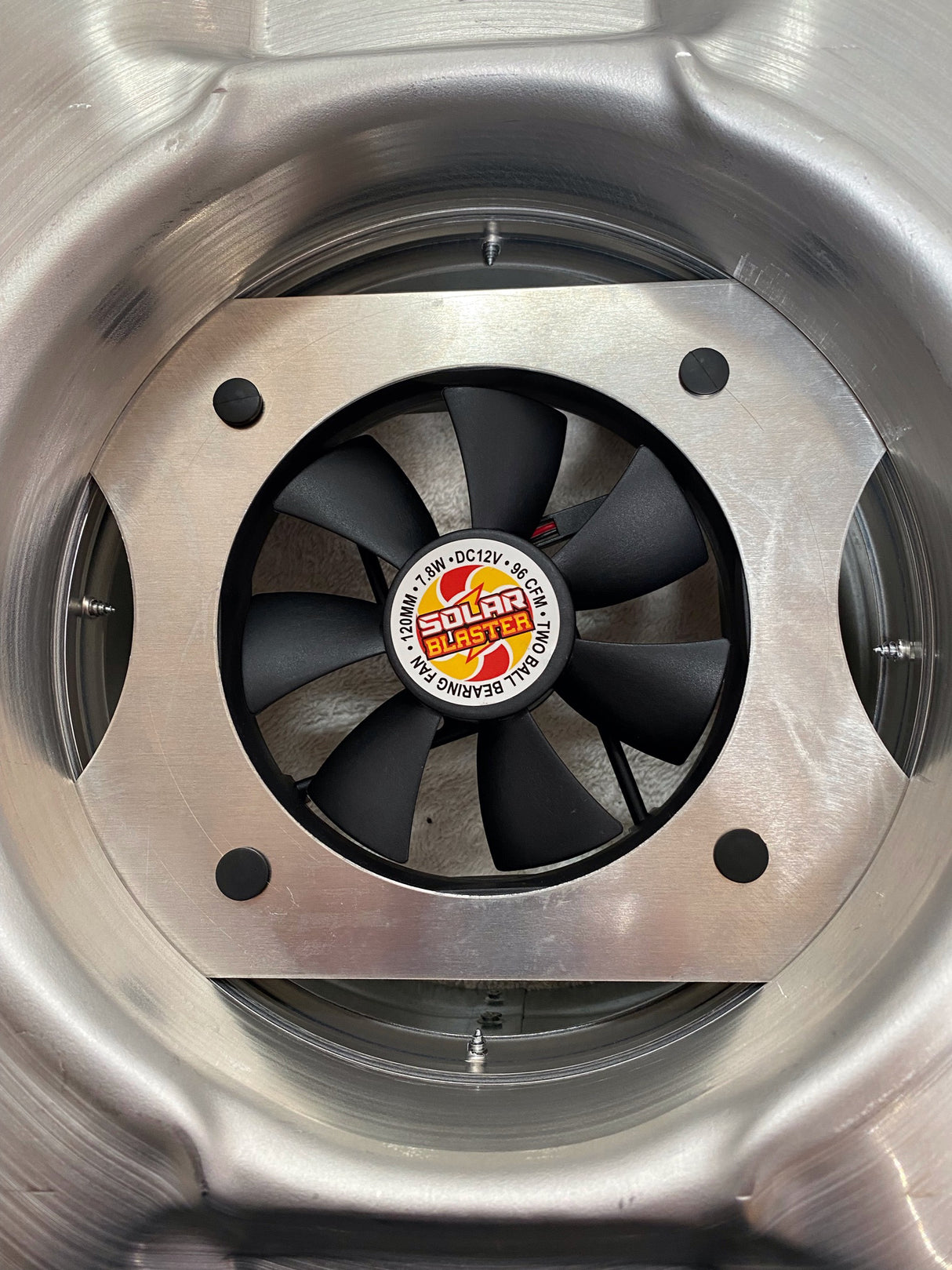 The underside view of the Conex Solar Mega RoofBlaster which shows the fan unit that is installed inside the neck of the vent.