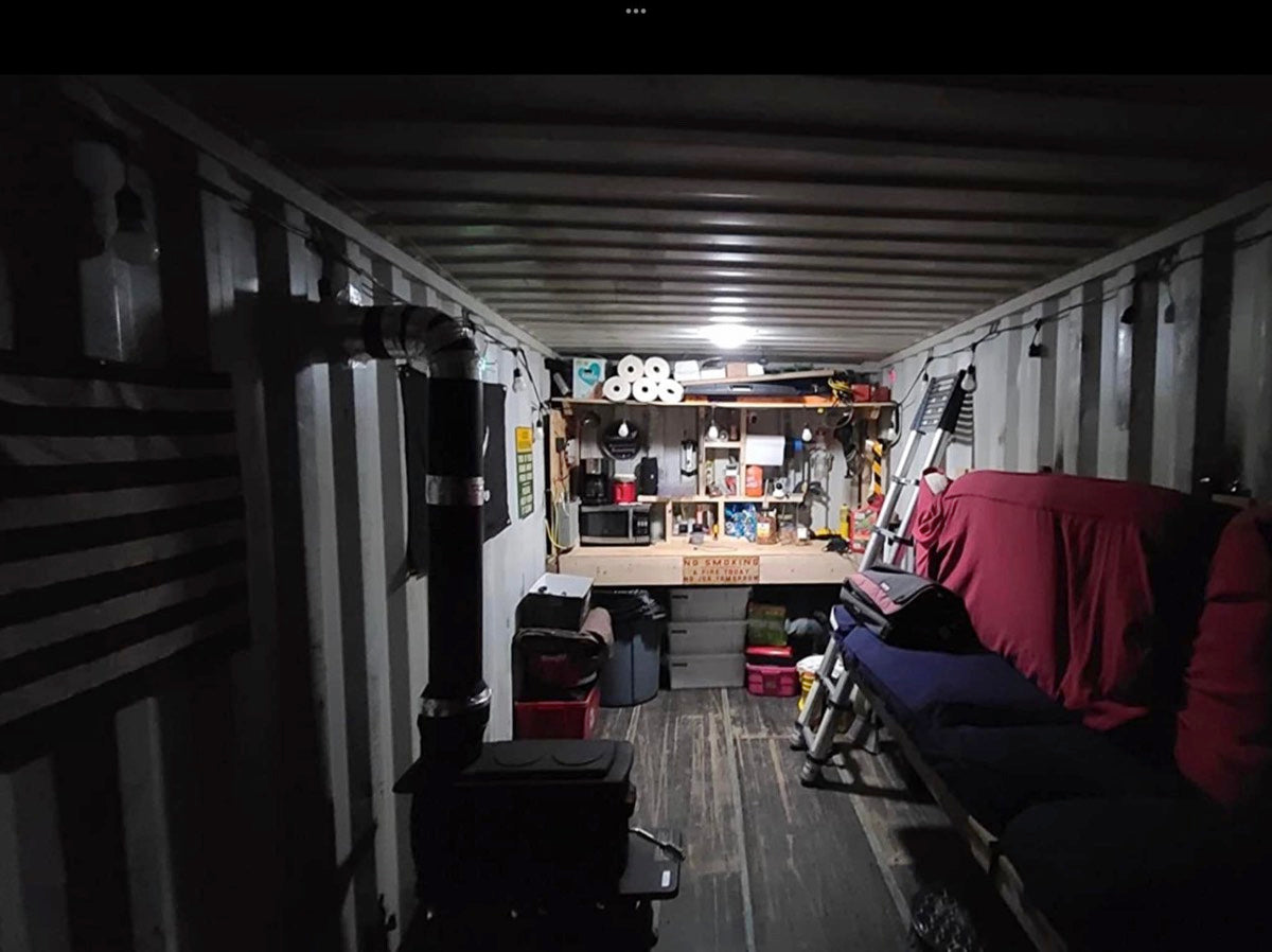 Shipping container showing the effectiveness of adding a Conex Solar LightBlaster tubular skylight. 