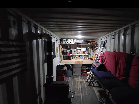 Shipping container showing the effectiveness of adding a Conex Solar LightBlaster tubular skylight. 