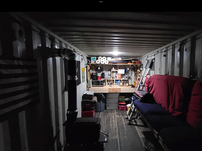 Shipping container showing the effectiveness of adding a Conex Solar LightBlaster tubular skylight. 
