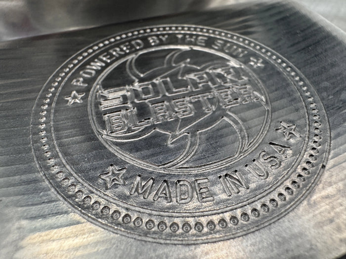 Metallic product with 'Solar Blaster' branding and 'Made in USA' text.