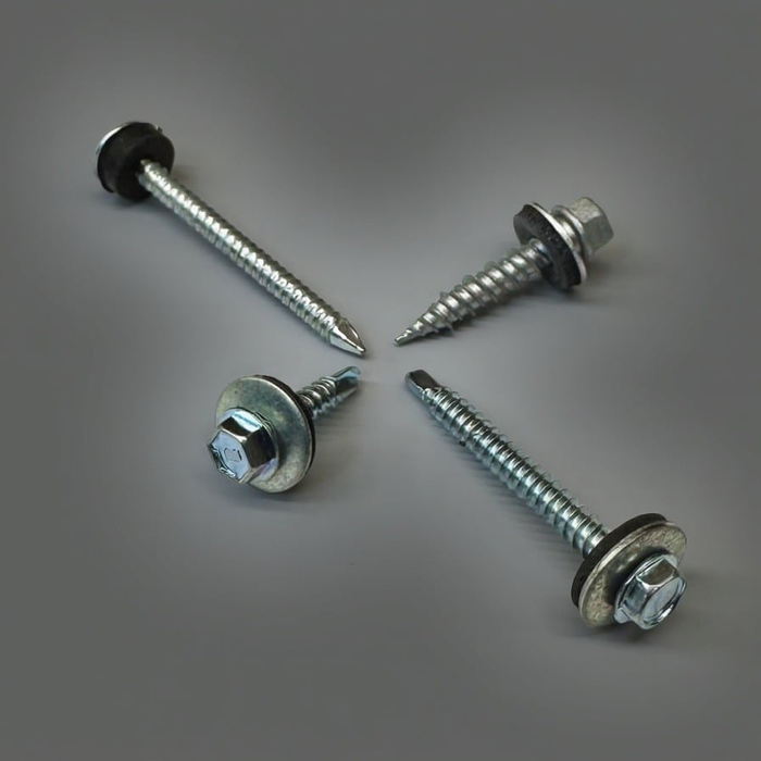 Four metal screws on a gray background to show the top-quality components Solar Blaster includes in the Installation Hardware Kits with each product.