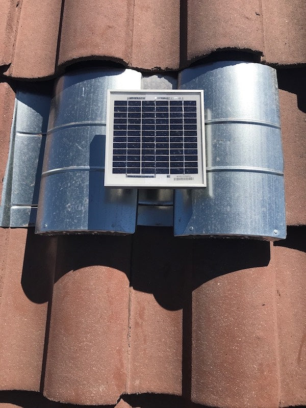 Solar S-TileBlaster installed on a roof that uses "S" style O'Hagin vent. The vent has not been painted yet to match the rest of the tiles.