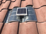 Solar S-TileBlaster installed on a roof that uses "S" style O'Hagin vent. The vent has not been painted yet to match the rest of the tiles.