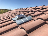 Solar S-TileBlaster installed on a roof that uses "S" style O'Hagin vent. The vent has not been painted yet to match the rest of the tiles.