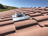 Solar S-TileBlaster installed on a roof that uses "S" style O'Hagin vent. The vent has not been painted yet to match the rest of the tiles.