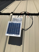Solar Metal RidgeBlaster with all parts installed onto a shed's metal roof before the ridge cap is placed.