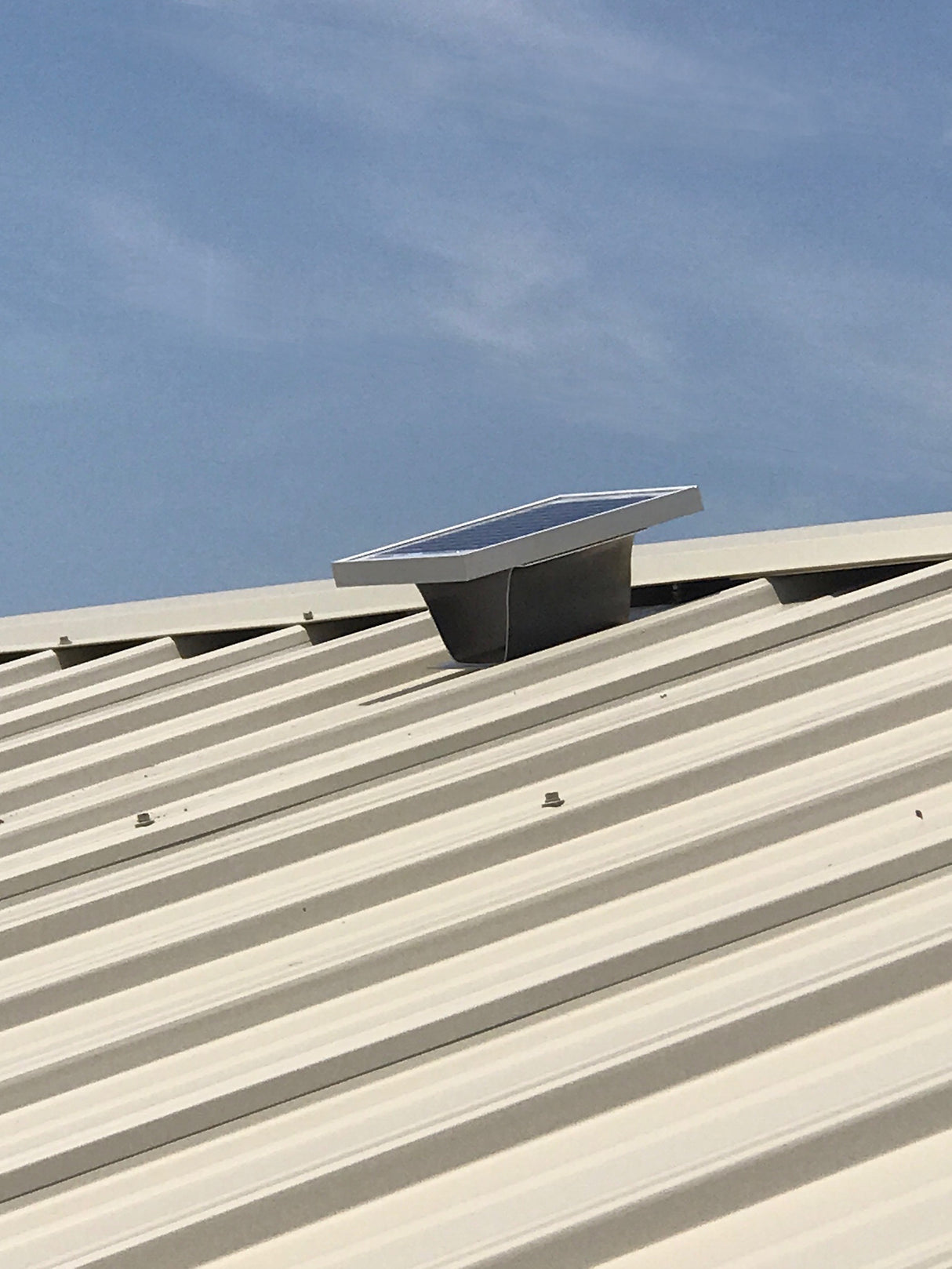 Solar Metal RidgeBlaster installed on a shed's metal roof.