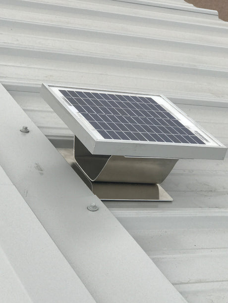 Solar Metal RidgeBlaster installed on a shed's light gray metal roof.