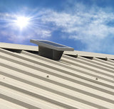 Solar Metal RidgeBlaster installed on a shed's beige metal roof.