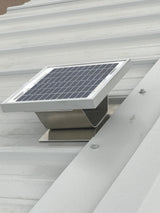 Solar Metal RidgeBlaster installed on a shed's light gray metal roof.