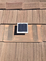Solar Metal RidgeBlaster installed on a house's roof that has O'Hagin's flat tiles.